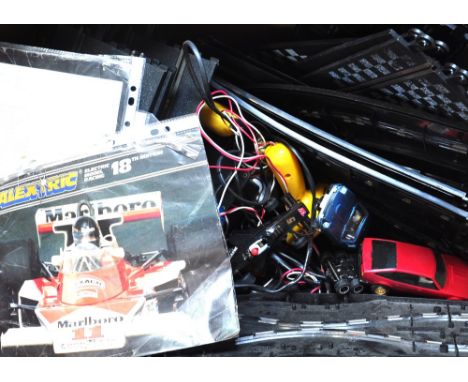 A quantity of Scalextric to include cars, track & controllers.
