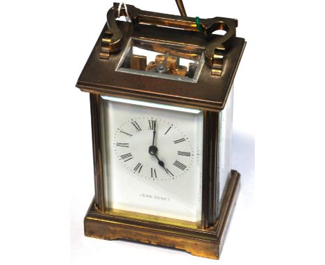 An early to mid 20th century French Jean Renet brass carriage clock with bevelled glass and winding key.