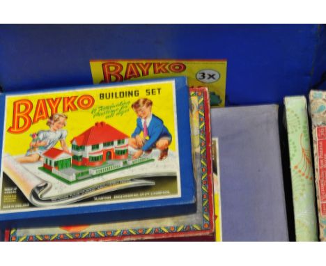 A vintage boxed Bayko converting set, two Bayko building sets, a boxed blow football game and a further small quantity of box
