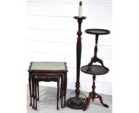 A reproduction nest of three tables, two small occasional tables on tripod supports and a standard lamp (4).
