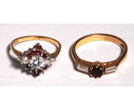 Two 9ct gold ladies dress rings, one set with large central white stone surrounded by red and white stones, size O, and anoth