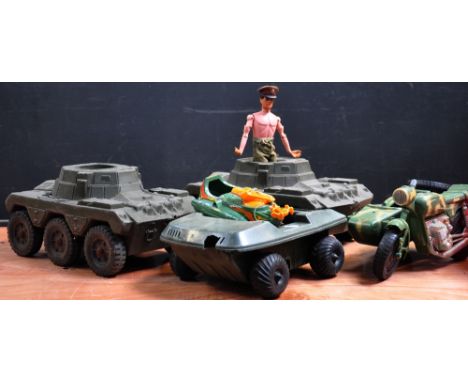 A vintage 'Action Man' figure with flock hair, two armoured-cars, motorbike & sidecar and an off-road buggy (5).