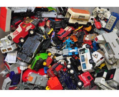 A large collection of playworn Corgi and Dinky die-cast cars together with assorted other vehicles to include "Transformers" 