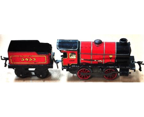 A Hornby O gauge tin plate clockwork 0-4-0 tender locomotive in red livery. CONDITION REPORT Excellent condition for age, sli