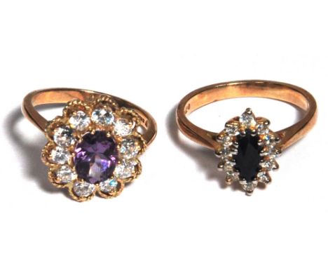 Two 9ct gold ladies dress rings, one set with white and amethyst colour stones size N, one with central dark blue stone and s