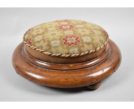 A Late Victorian Circular Walnut Tapestry Upholstered Footstool, 34cm diameter 