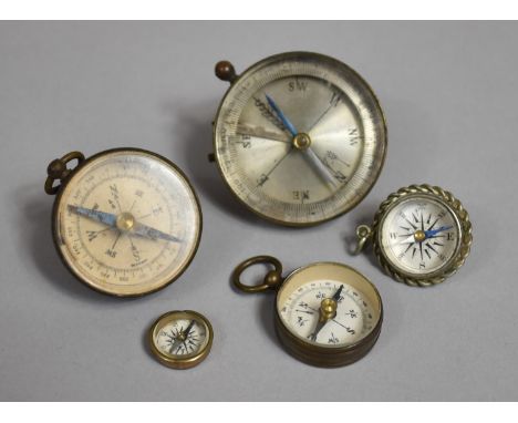 A Collection of Five Various Vintage Compasses and Compass Pendants