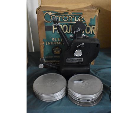 A Coronet Vintage Film Projector with 9.5mm Spools and Films 