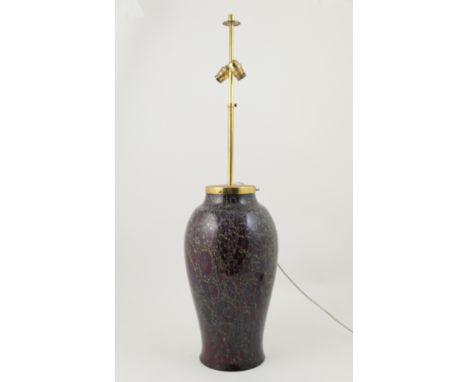 Decorative glass and brass mounted table lamp, ovoid form of purple marbled glass speckled with bubbles and veined, brass fit