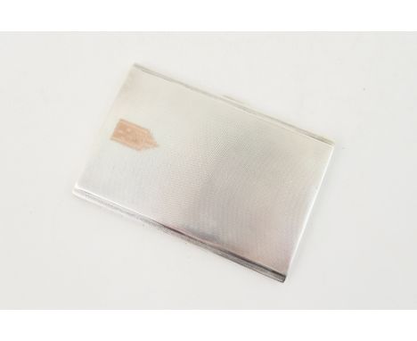 George VI silver cigarette case, Birmingham 1938, engine turned rectangular form with an initialled gold cartouche 'J P A', 1