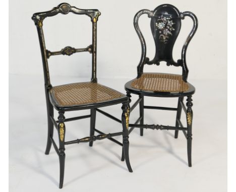 Two Victorian black lacquered and mother of pearl inlaid side chairs, circa 1850, each with gold foliate details and cane sea