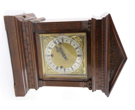Winterhalter & Hoffmeister oak mantel clock, circa 1910, architectural case with Corinthian pilasters flanking a brass square