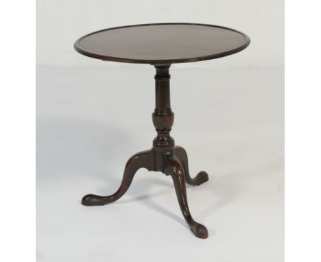 Mahogany dished top tripod table, late 19th Century, circular top with a moulded edge of a turned baluster column and three s