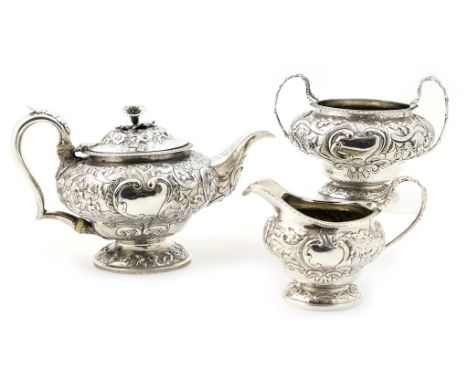 George IV silver three piece tea service, maker probably Henry Holland, London 1824/5, comprising lidded teapot, surmounted w