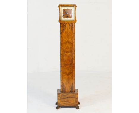 Art Deco walnut granddaughter clock, circa 1935-40, having a square dial with silvered chapter ring and Roman numerals, Westm