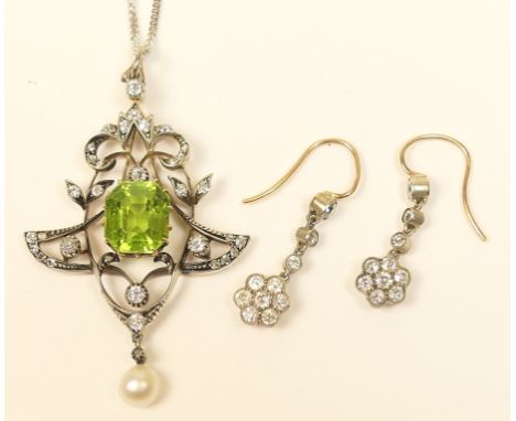 Attractive Edwardian diamond, peridot and pearl openwork pendant, the central emerald cut peridot of approx. 2cts bordered wi