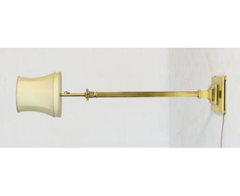 Edwardian brass Corinthian column standard lamp, with stepped square base on bun feet, height to the top of the shade 162cm