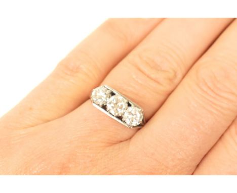 Diamond three stone ring, well matched brilliant cut stones, each of approx. 0.5ct and estimated as G/H in colour and VS2 cla