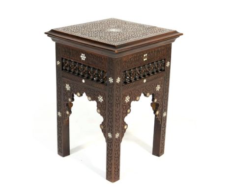 Liberty & Co. 'Islamic' carved and mother of pearl inlaid table, in the manner of Leonard Wyburd, square shape carved with ca