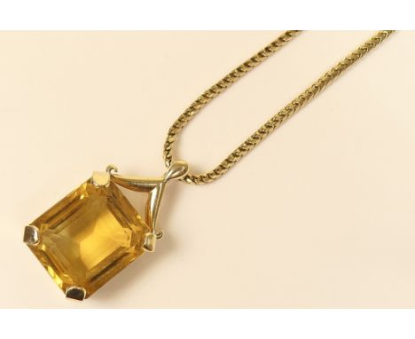 Citrine pendant necklace in 9ct gold, the large single step cut citrine of approx. 15cts, claw mounted in a 9ct gold pendant 