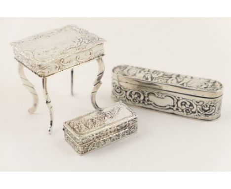 Dutch silver novelty table form ring box, London import marks for 1898, with hinged cover decorated with a town view, raised 