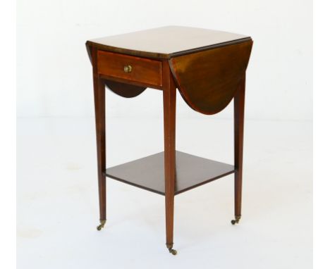 Edwardian mahogany drop leaf occasional table, the oval top crossbanded and with drop leaves, over a single drawer with press