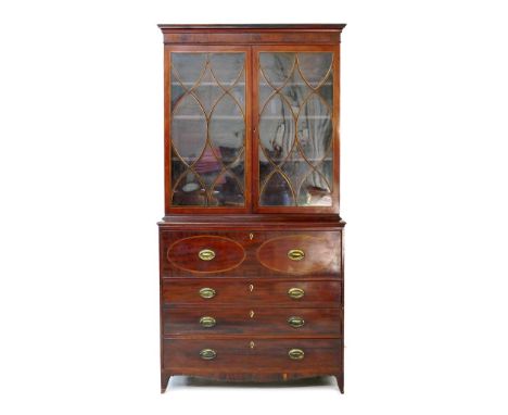 Regency mahogany secretaire bookcase, circa 1815-25, with a cavetto moulded cornice over two boxwood strung astragal glazed d