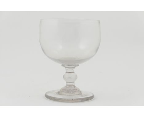 Large grape glass, early 19th Century, the deep bowl raised on a knopped stem and stepped circular foot, height 17.5cmProvena