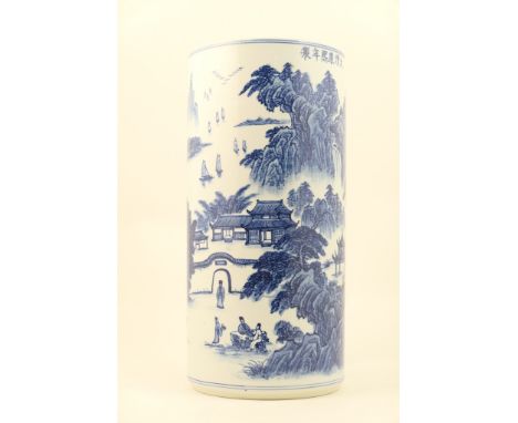 Chinese Republic blue and white painted porcelain stick stand, cylinder form decorated with a mountainous lakeland landscape,