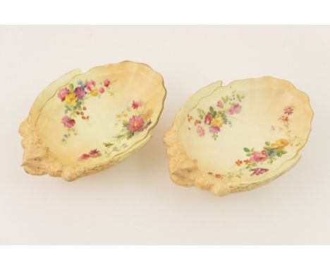 Pair of Royal Worcester peach ground quail dishes, circa 1913, each decorated with wild flower floral sprays in colours on a 