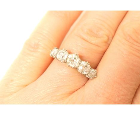 Diamond five stone ring, in 18ct white and yellow gold, graduated old brilliant cut stones, the largest approx. 0.45ct, total