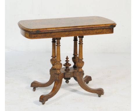 Victorian burr walnut and inlaid folding card table, circa 1855, the folding top inlaid with boxwood and ebony, swivelling op