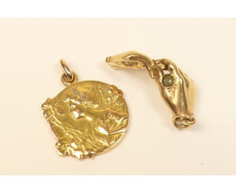 Art Nouveau yellow gold pendant by Emile Dropsy, circa 1900, worked with the profile of a young lady with tiny rose cut diamo