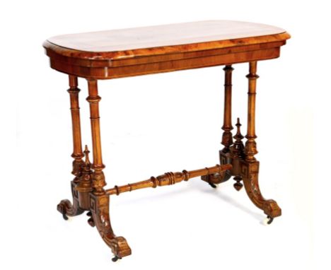 Victorian burr walnut and inlaid folding card table, circa 1860, the rounded rectangular top with quarter veneers swivelling 