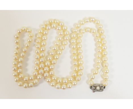 Cultured pearl necklace, having well matched pearls of uniform size, approx. 6mm diameter, united by a 9ct white gold and pea