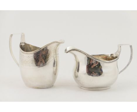 George III silver milk jug, London 1805, helmet shaped with a band of wrigglework foliate guilloche decoration, inscribed wit
