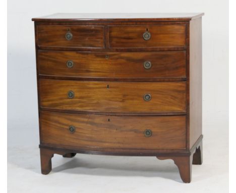 Victorian mahogany bowfront chest of drawers, fitted two short and three long graduated drawers with cast brass ring handles,