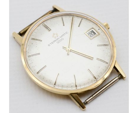 Herrenarmbanduhr "ETERNA-MATIC 3000". Rundes 750/000 GG-Gehäuse, brutto 27,2 g. Guillochiertes, mattsilbernes Zifferblatt mit