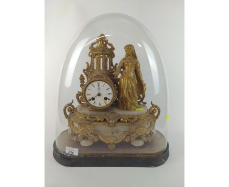 Gilt metal and marble clock under glass dome. H42cmIn need of restoration, areas of damage to face and other areas. 