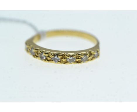 Yellow metal & seven stone diamond half hoop ring, tests positive for 18ct gold, size Q, 3 grams 