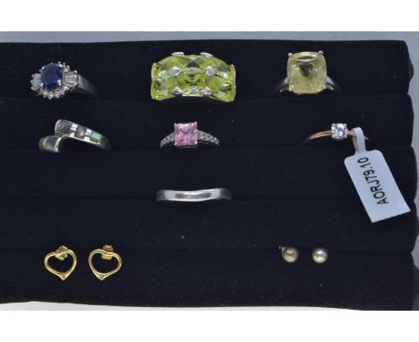 Seven 925 silver rings, including some gem set, various sizes, together with two pairs of silver ear studs, gross weight 41.7