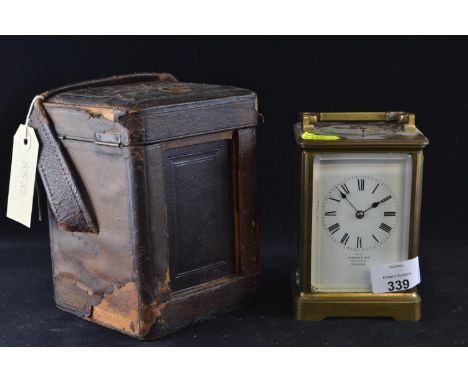 Lawson & son carriage clock with key in leather travel case 