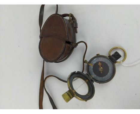 WWI brass cased military compass, dated 1917, No 76777, cross foot mark, with leather case stamped 'L.F & Co', dated 1916 & i