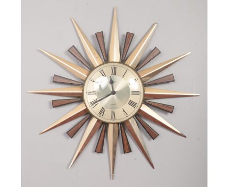 A retro Metamec starburst wall clock.  