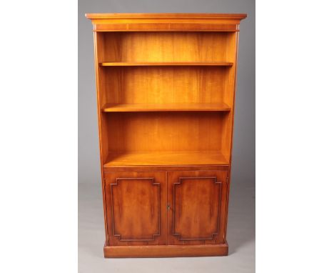 A Yew Wood Two Shelf Open Bookcase with Lockable Lower Cabinet. H: 182cm, W: 95cm.  