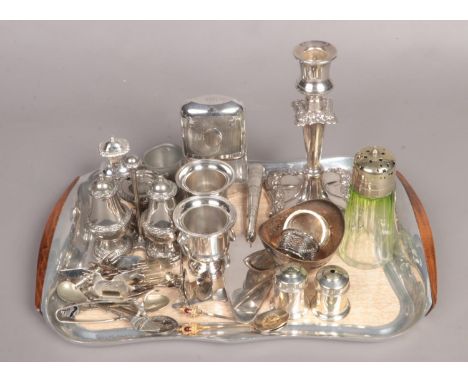 A Piquot aluminium tray with an assortment of EPNS oddments. To include flask, napkin rings, and condiment sets etc.  