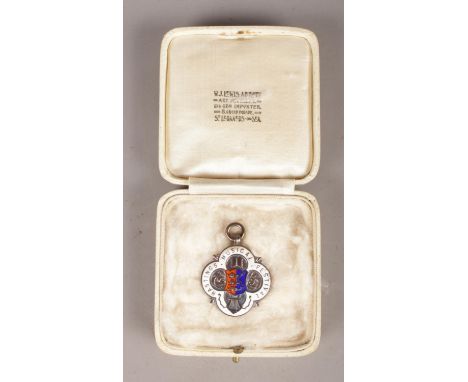 A Silver and Enamel Medal awarded at the Hastings Musical Festival to 'Bernard Baker' for Organ Playing in March 1951. Emboss