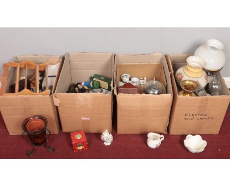 Four boxes of miscellaneous. Brass oil lamps, ceramic oil lamps etc  