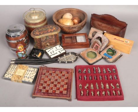 A box of collectables. Including chess set, treen, dominoes, etc.  