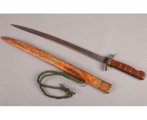 A short sword with oriental style scabbard. marked W.T. &amp; S England.  